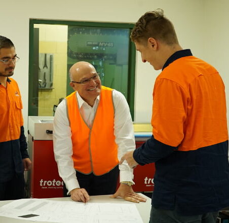 A group of man discussing plan at the table